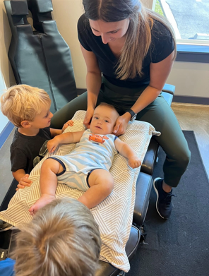 Dr. Paige providing pediatric care